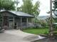 Ranch Style Barn Arena with 8 Stalls Huge Heated 5 Bay Shop and Home