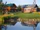 180 Park-Like Acres- River and Custom Log Home Photo 1