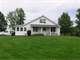 Lovely Home with Beautiful Land and Barns Photo 1